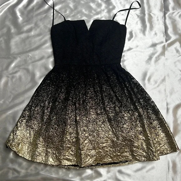 gold patterned strapless dress with white lining Sherri Hill Strapless Short A-line Homecoming Dress 56649 main image 0